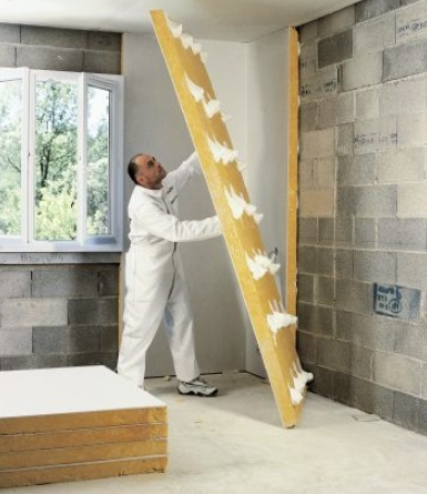 Les panneaux composites collés constituent un façon simple et efficace pour l'isolation des murs intérieurs - doc. Isover (Calibel)